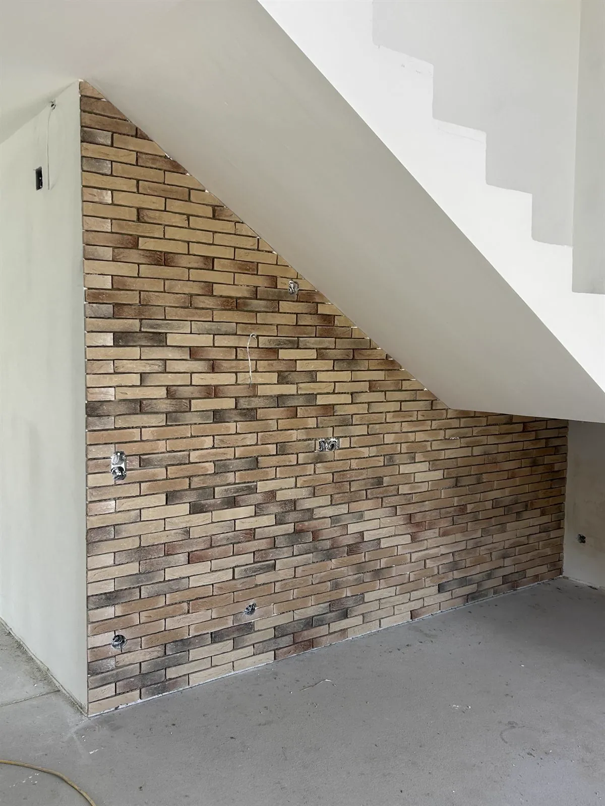 Klinkerwand an der Treppe